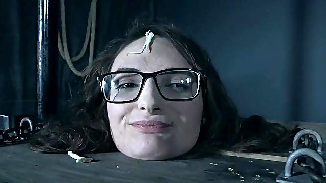 Pretty girl in a rope bondage suspension gets her pussy vibrated