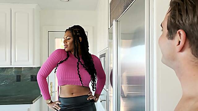 Halle Hayes gets her shaved pussy fingered in the kitchen.