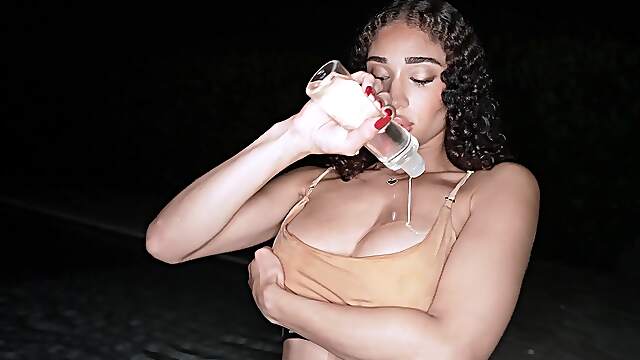 Curly beauty lubes her love holes big time in advance to fuck like a pro