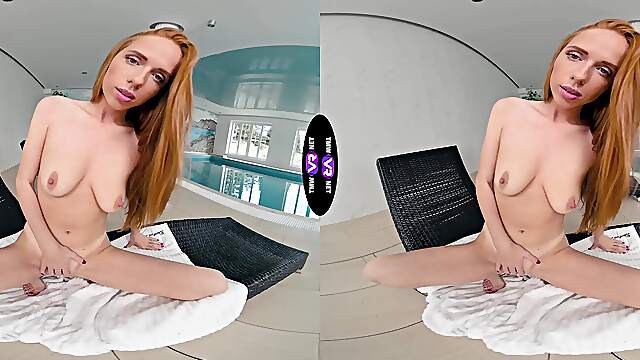 Redhead beauty Holly Molly wanking her pussy in the kitchen