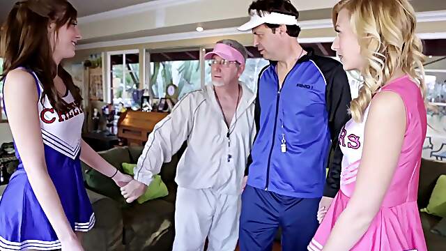 Redheaded Alexa takes a thick cock in her mouth while blonde Molly watches