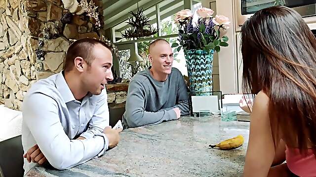 Lily's luscious locks sway as Chad and Richie take turns pleasuring her in a steamy MMF encounter