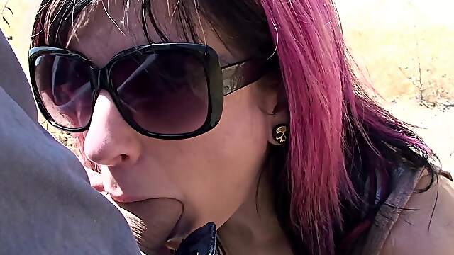 Punky babe with tattoos gives James a wild POV BJ under the sun