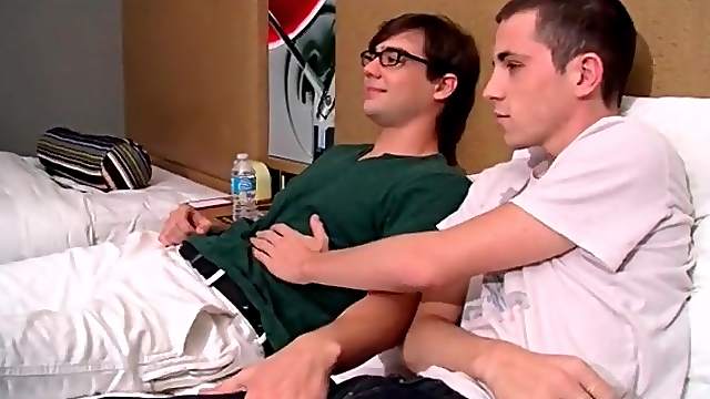 Nerdy teens fool around in bed and suck dick
