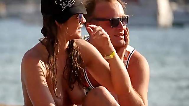 Cute topless girls spied on at the beach