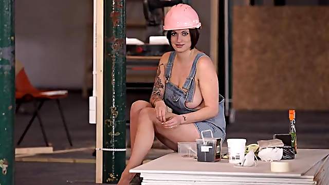 Construction working chick teases those big tits
